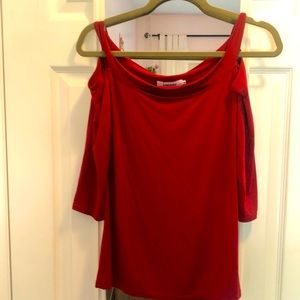 Red peekaboo cold shoulder top. Never worn.
